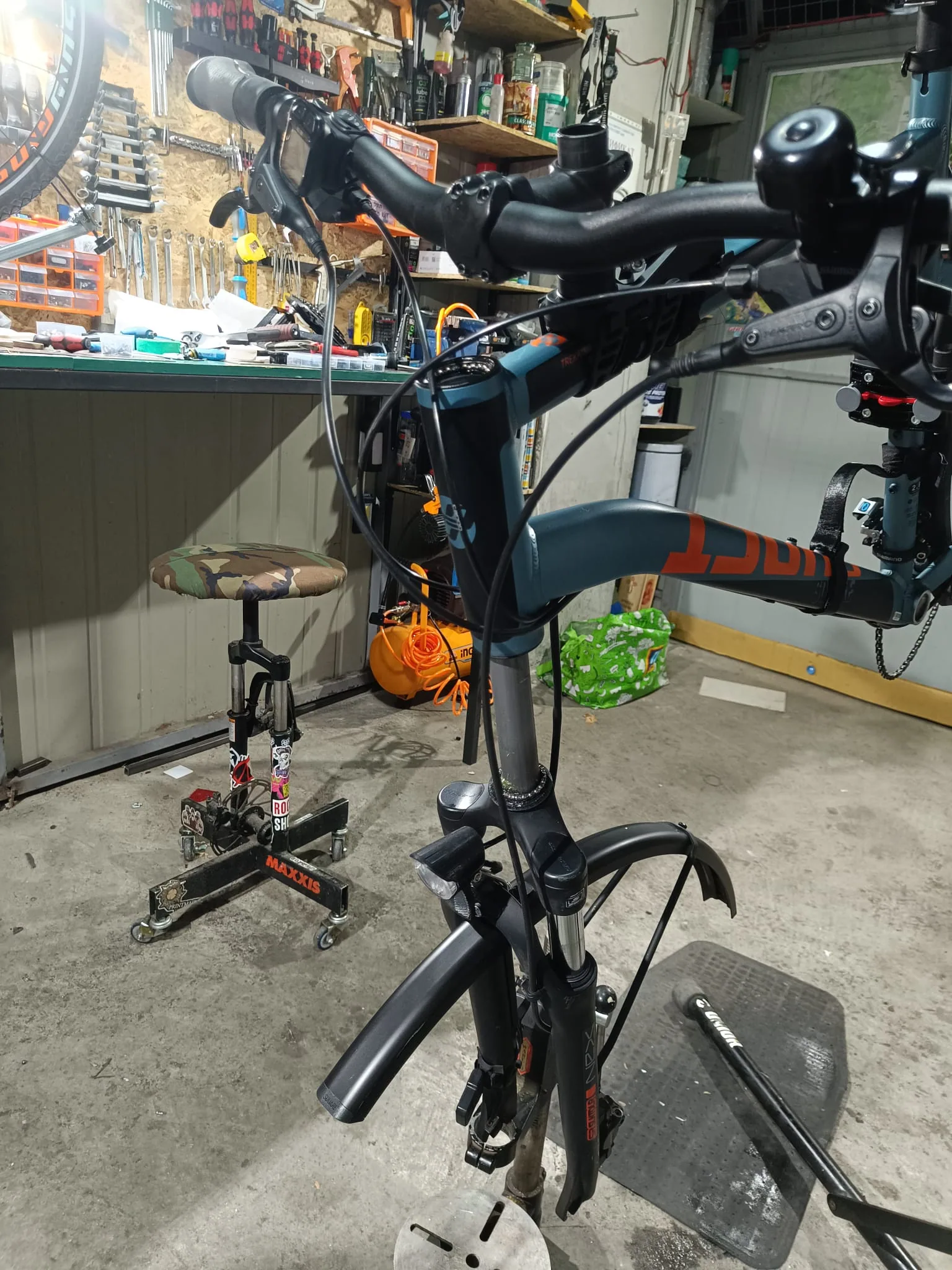 Mountain bike fork and handlebars during servicing