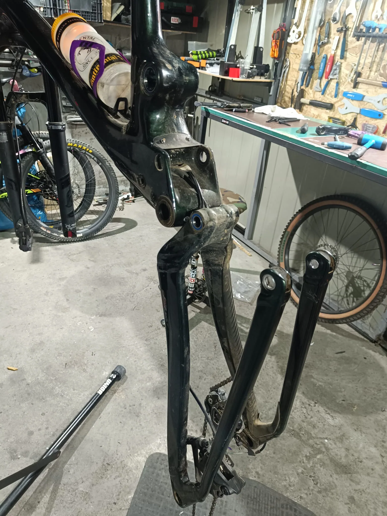 Rear suspension disassembled for servicing