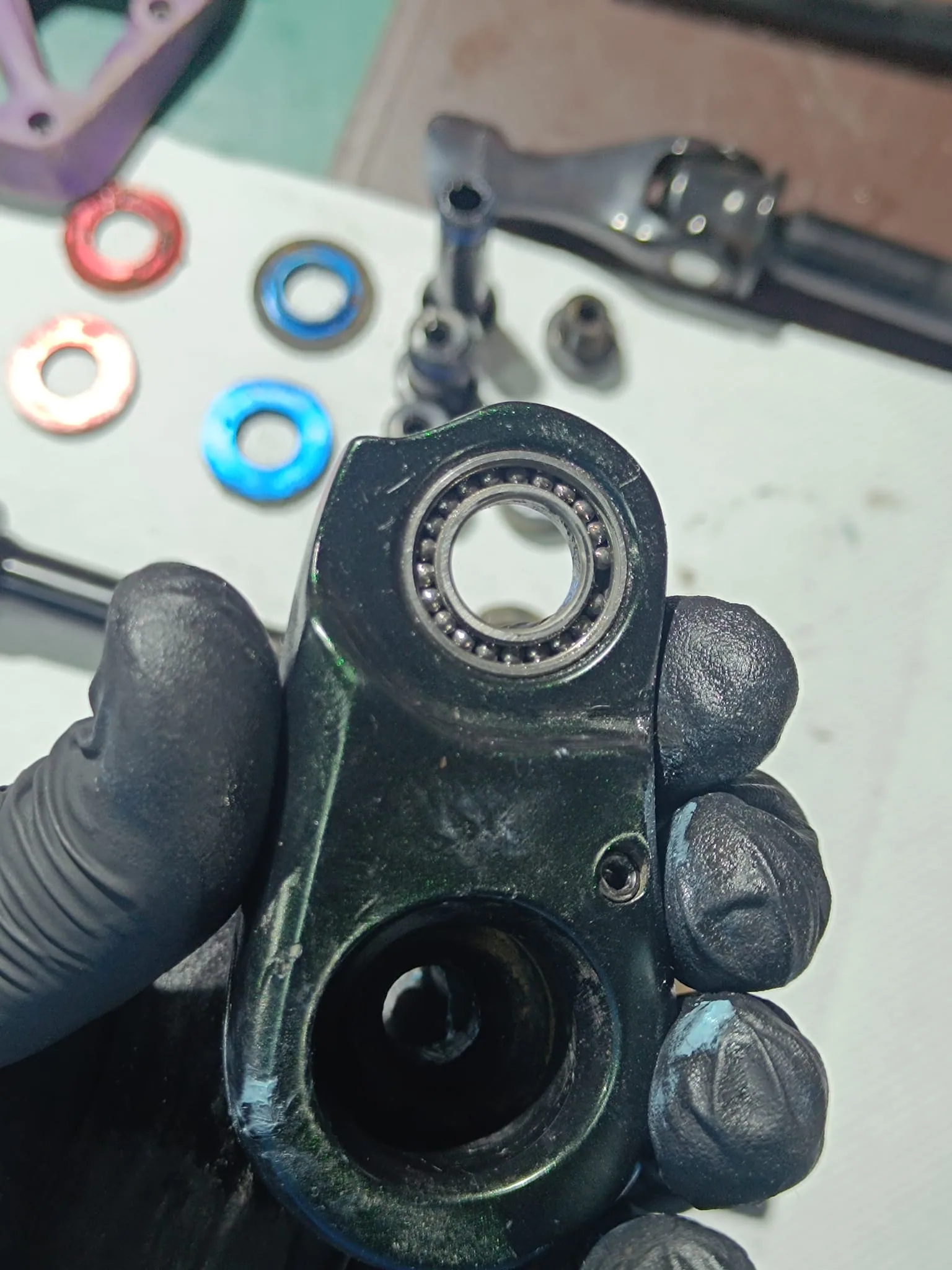 Inspection of an exposed suspension linkage bearing